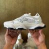 New Balance 9060 sneaker in a White and Metallic Silver
