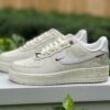 Nike Air Force 1 Low Year of the Dragon 2024 FD0746-100 Sail White Cream Embossed Dragon Pattern Lunar New Year Red Mini Swoosh Sneakers
